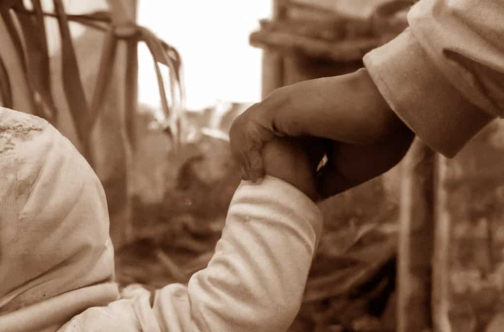 Mother and a child in wrecks